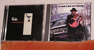 R: John Lee Hooker - Mr. Lucky
<br/><br/>
L: Fink - Vogelbeobachtung im Winter