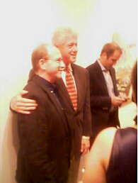 Saltz and Bill Clinton pose at an art gallery exhibit opening (from Saltz' official Facebook-Page).