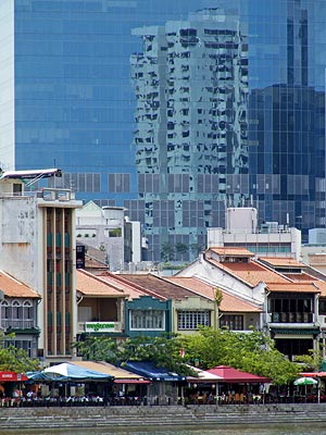 The Riverwalk Apartments reflected in Central Clarke Quay - Singapore