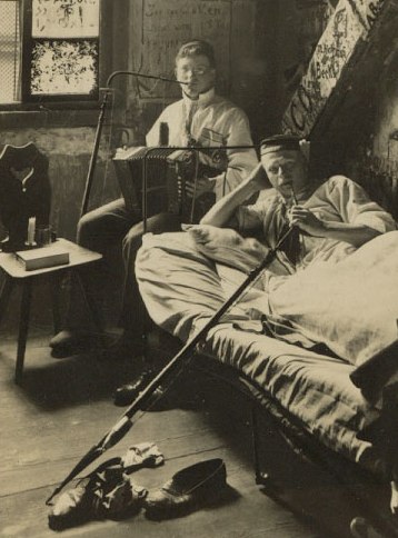 Students at the University of Heidelburg take a break from their studies while smoking opium (c. 1900)