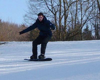 Lo's first steps on a snowboard - not bad for a beginner!