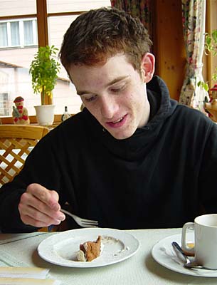 Lo eating a cake at &quot;Igelwirt&quot;