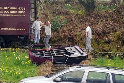 Hands on head moment as the piano lurches sideways and crashes upside down onto the bank