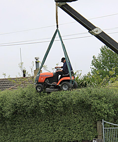 High rider trims his hedge 