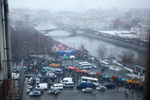 Protesters gather together to protest against alleged vote rigging in Russia's parliamentary elections in Moscow, Russia, Saturday, Dec. 10, 2011. Russians angered by allegedly fraudulent parliamentary elections are protesting Saturday in cities from the freezing Pacific Coast to the southwest of Russia, eight time zones away, a striking show of indignation, challenging Prime Minister Vladimir Putin's hold on power. (Pavel Golovkin)