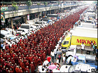 Burma monks march as police act