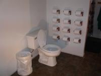 Install twelve toilet paper holders