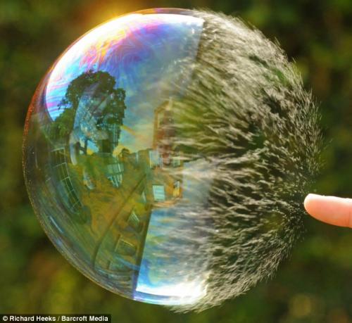 Super-slow-motion pictures show soap bubble