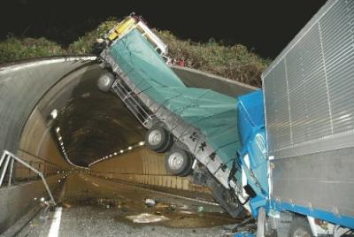 Trucks collide near tunnel entrance