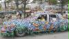 A car covered in flower petals