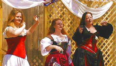 A Pic of a Trio of Bawdy Wenches Singing